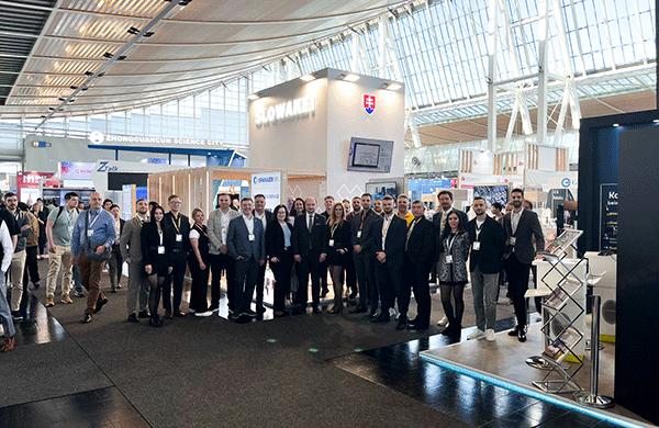 Slovak national stand at HANNOVER MESSE 2026 in Germany, with a delegation of Slovak entrepreneurs and SARIO representatives standing in front of the exhibition area.